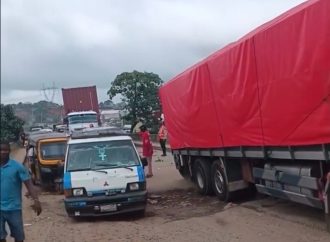 Gridlock Hits Onitsha–Owerri Road as Damaged Section Near Idemili River Worsens — Akelicious
